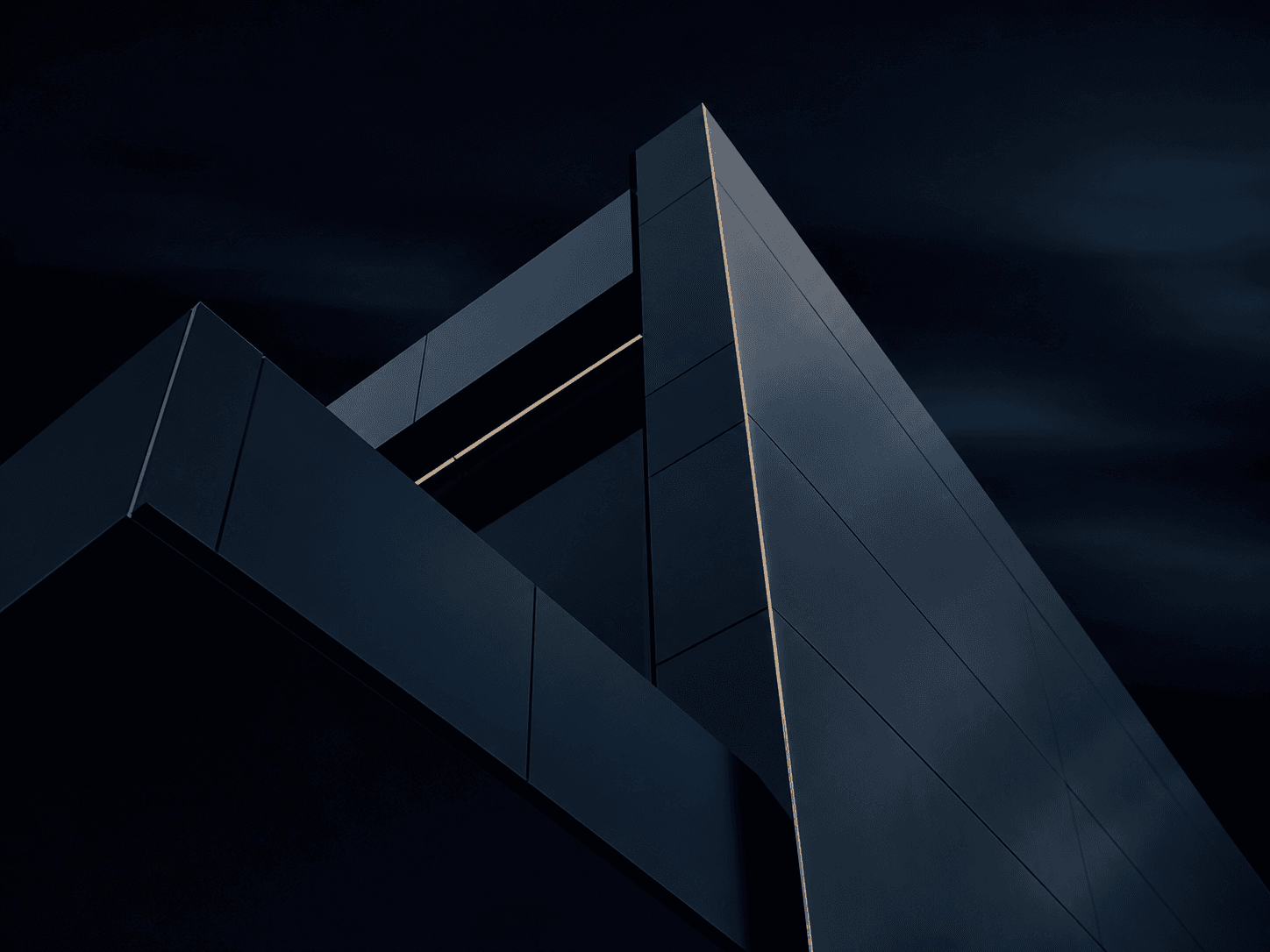 Modern angular building photographed at night